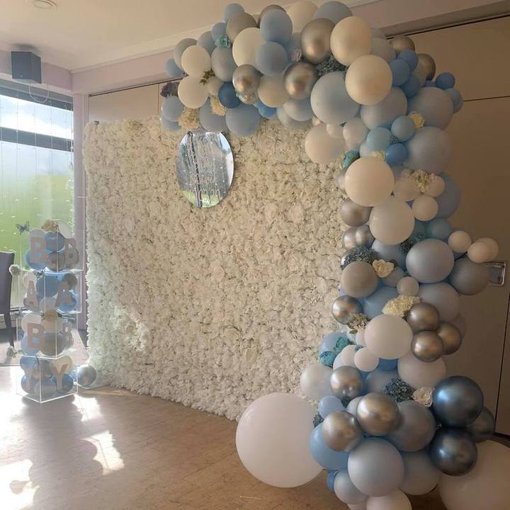 White Flower Wall with blue & white balloons