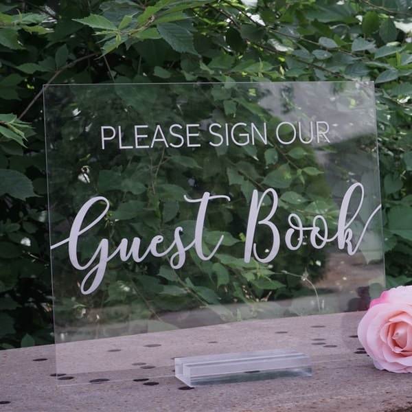 Clear acrylic Guest Book sign outside