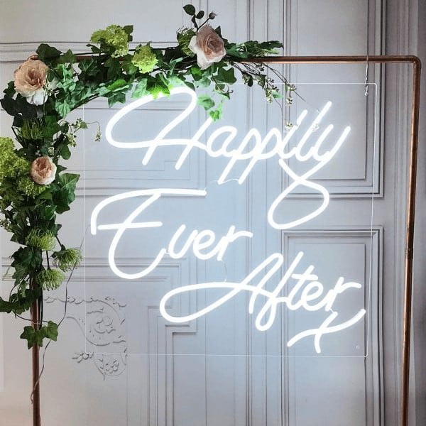 Happily Ever After sign on copper frame with flowers