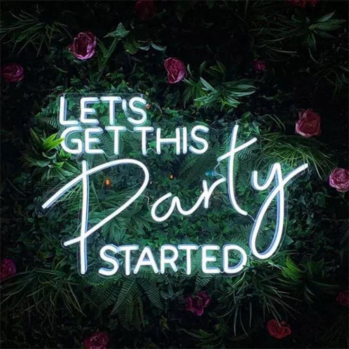 Lets Get This Party Started Rental sign on green leaves and pink flowers