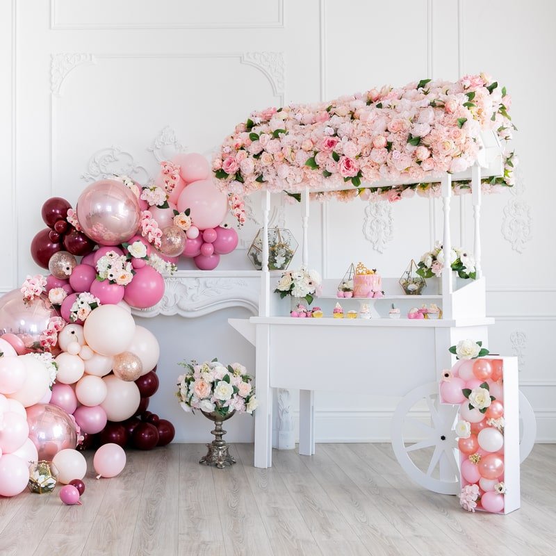 White Candy Cart with flower roof & pink balloons
