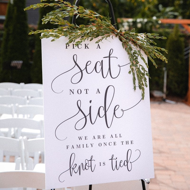 white seating sign