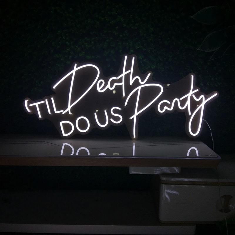 Til Death Do Us Party sign on table