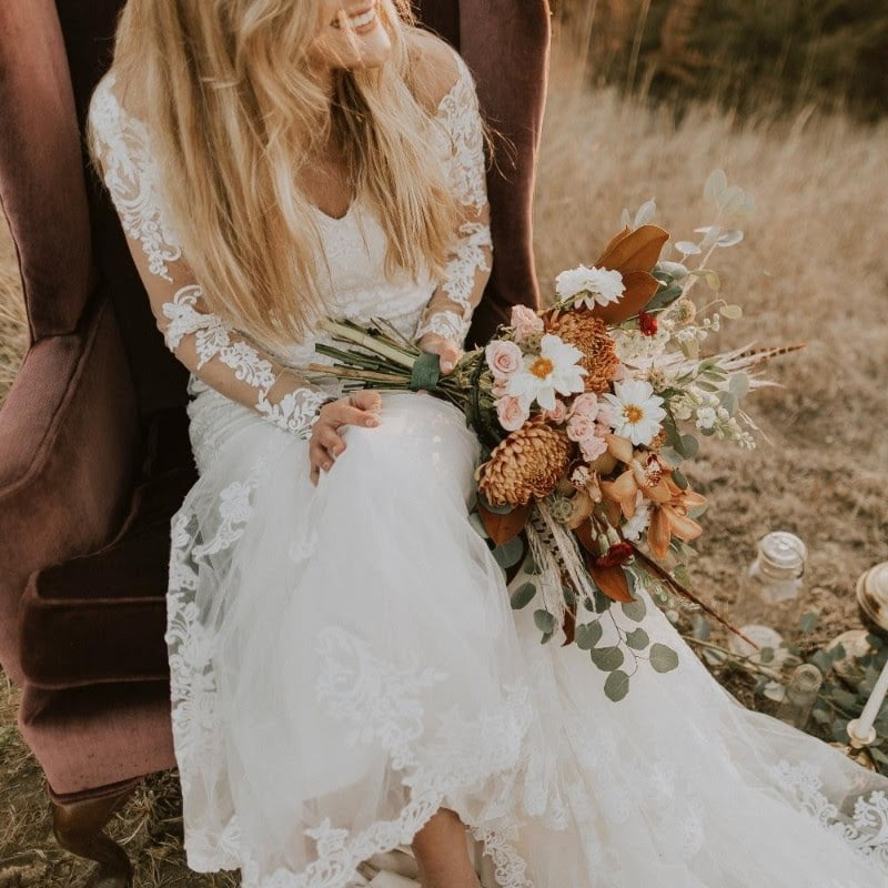 micro wedding 1 bride with bouquet of flowers