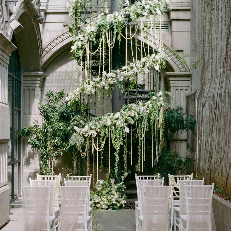 flowers on wall for wedding ceremony