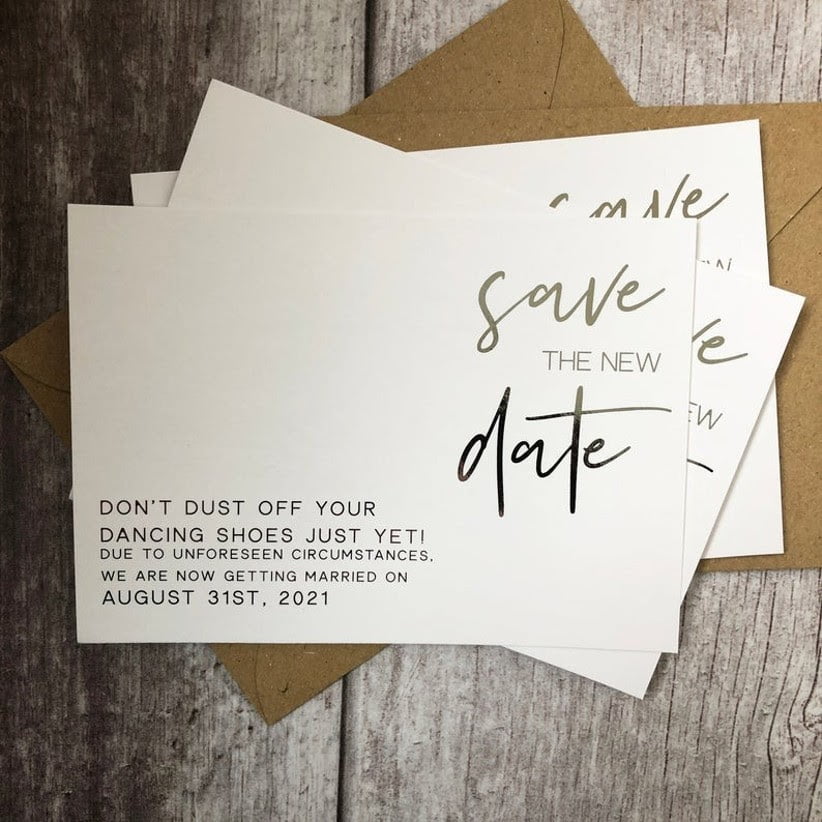postpone 5 wedding invites and envelopes